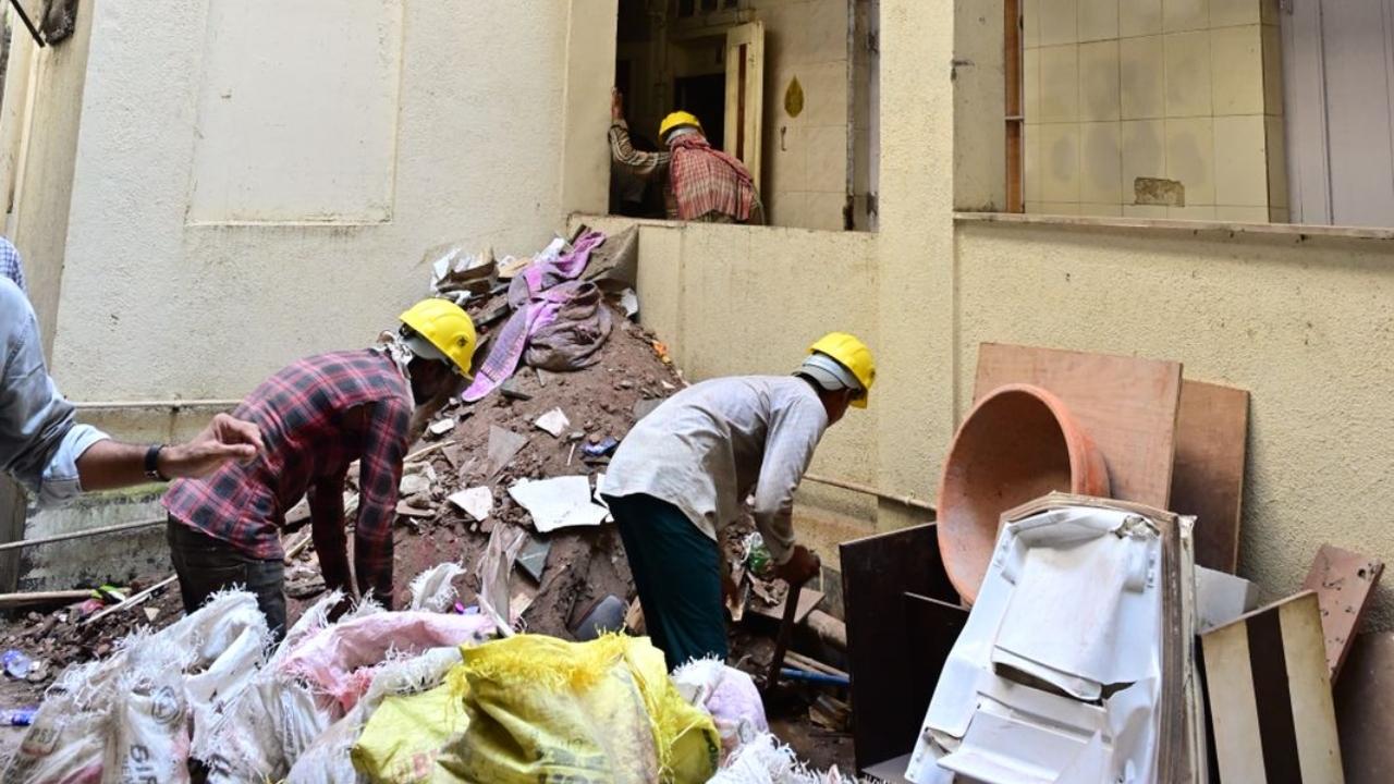 IN PHOTOS: Slabs of two floors collapse in four-storey building in south Mumbai